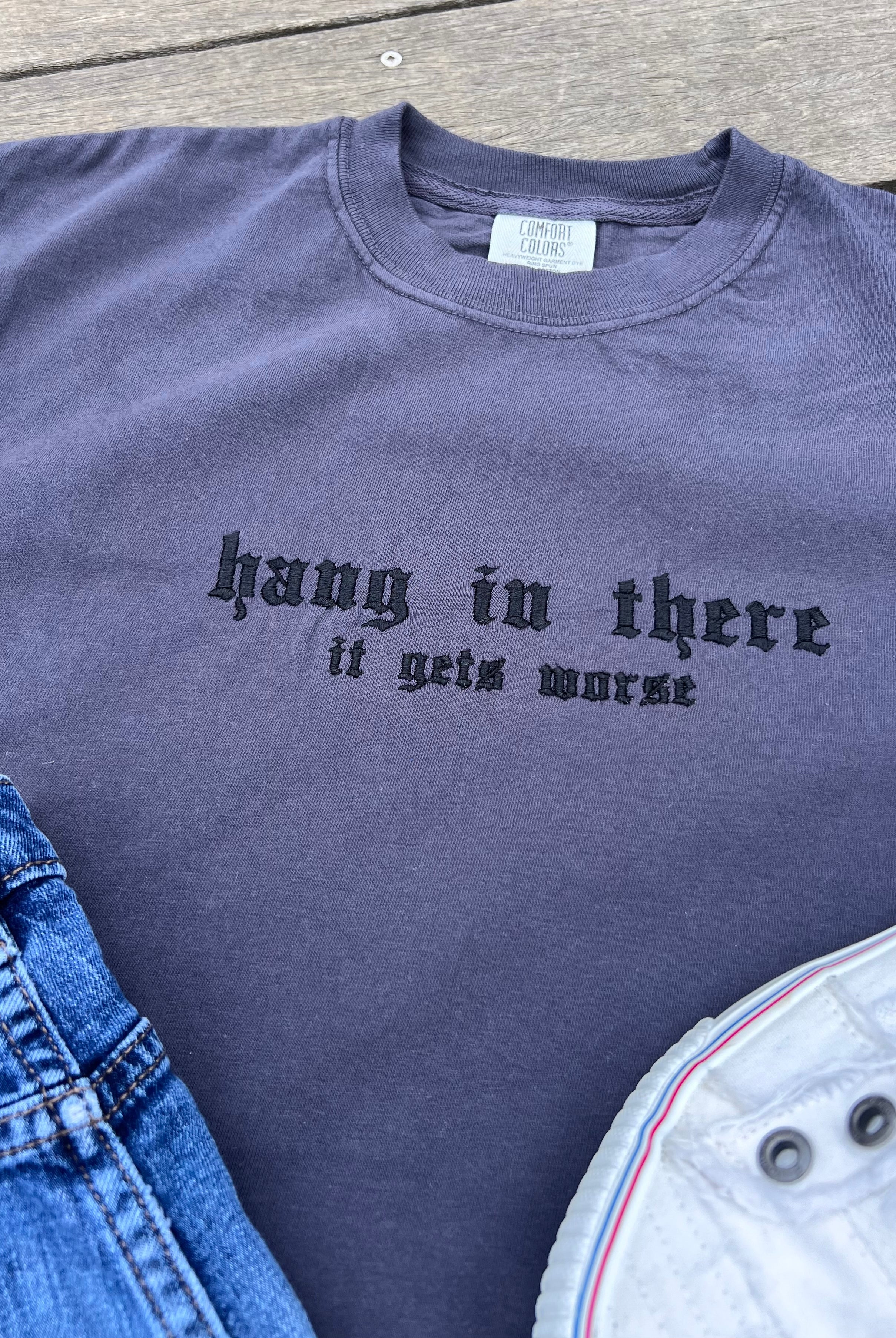 hang-in-there-it-gets-worse-t-shirt