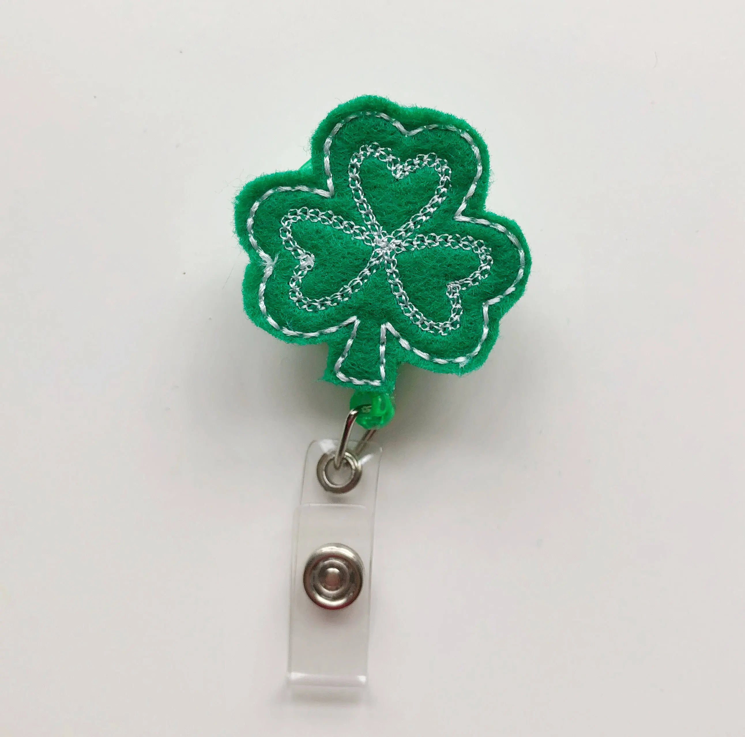shamrock badge reel