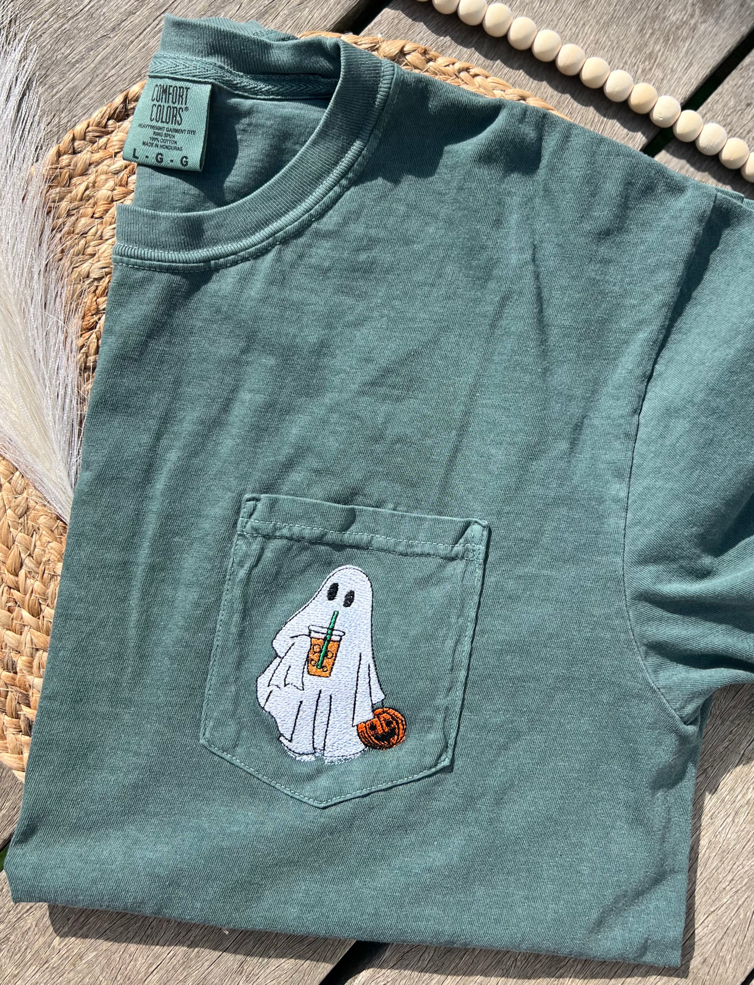 a sage embroidered pocket comfort color t-shirt with ghost and iced offee halloween design