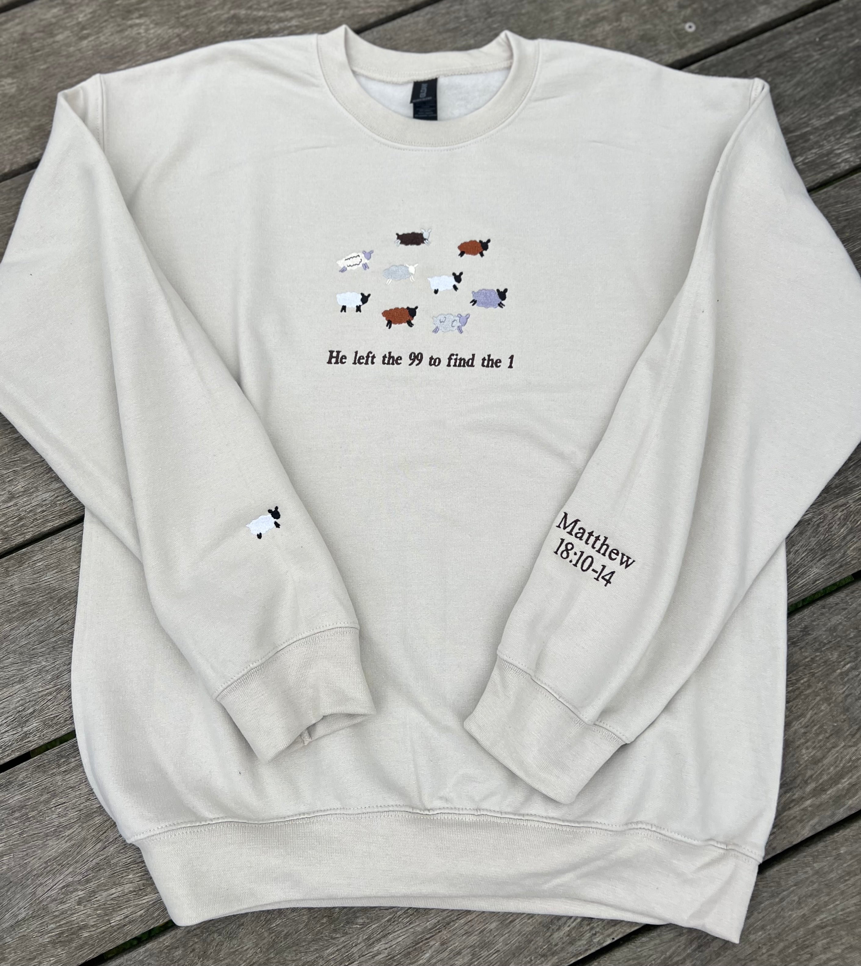 Beige sweatshirt embroidered with bible verse and he left the 99 to find the 1 meaning