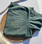green tshirt with bumblebees embroidered on pocket