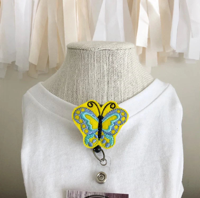 butterfly badge reel