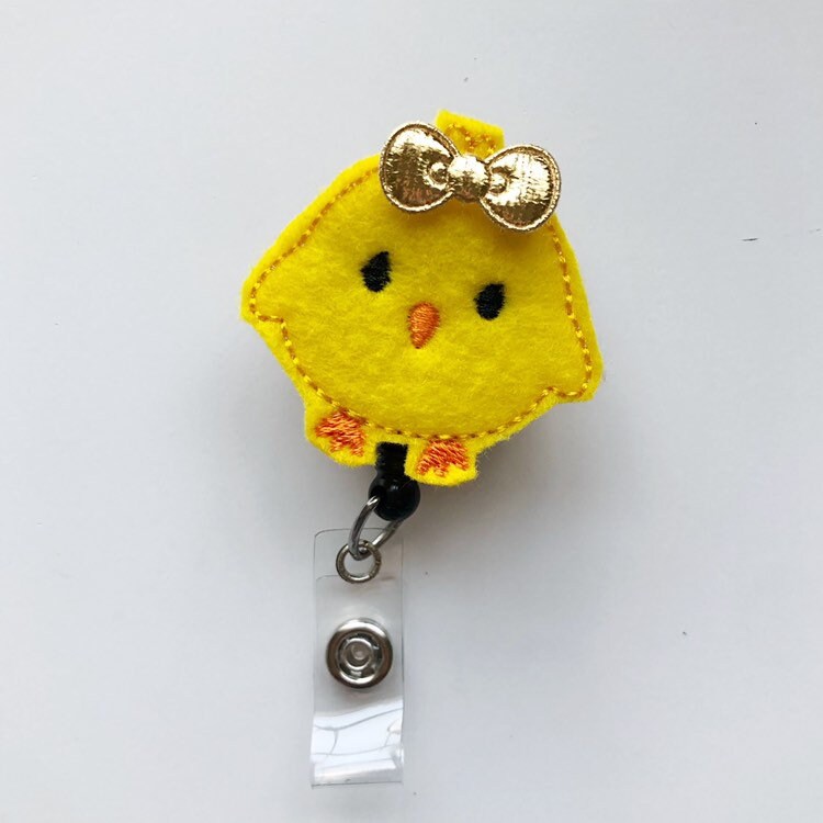 chick badge reel