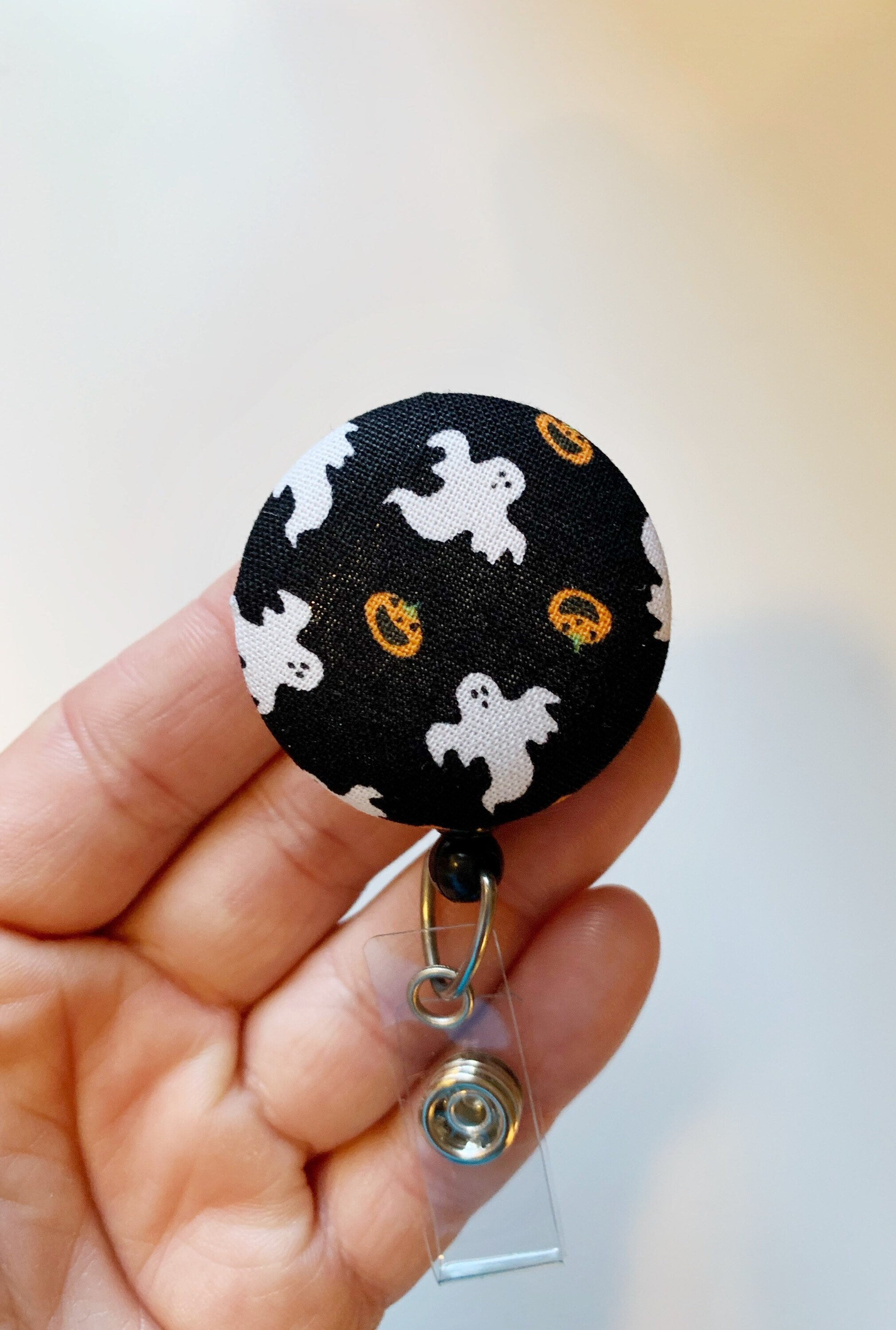 ghost_button_badge