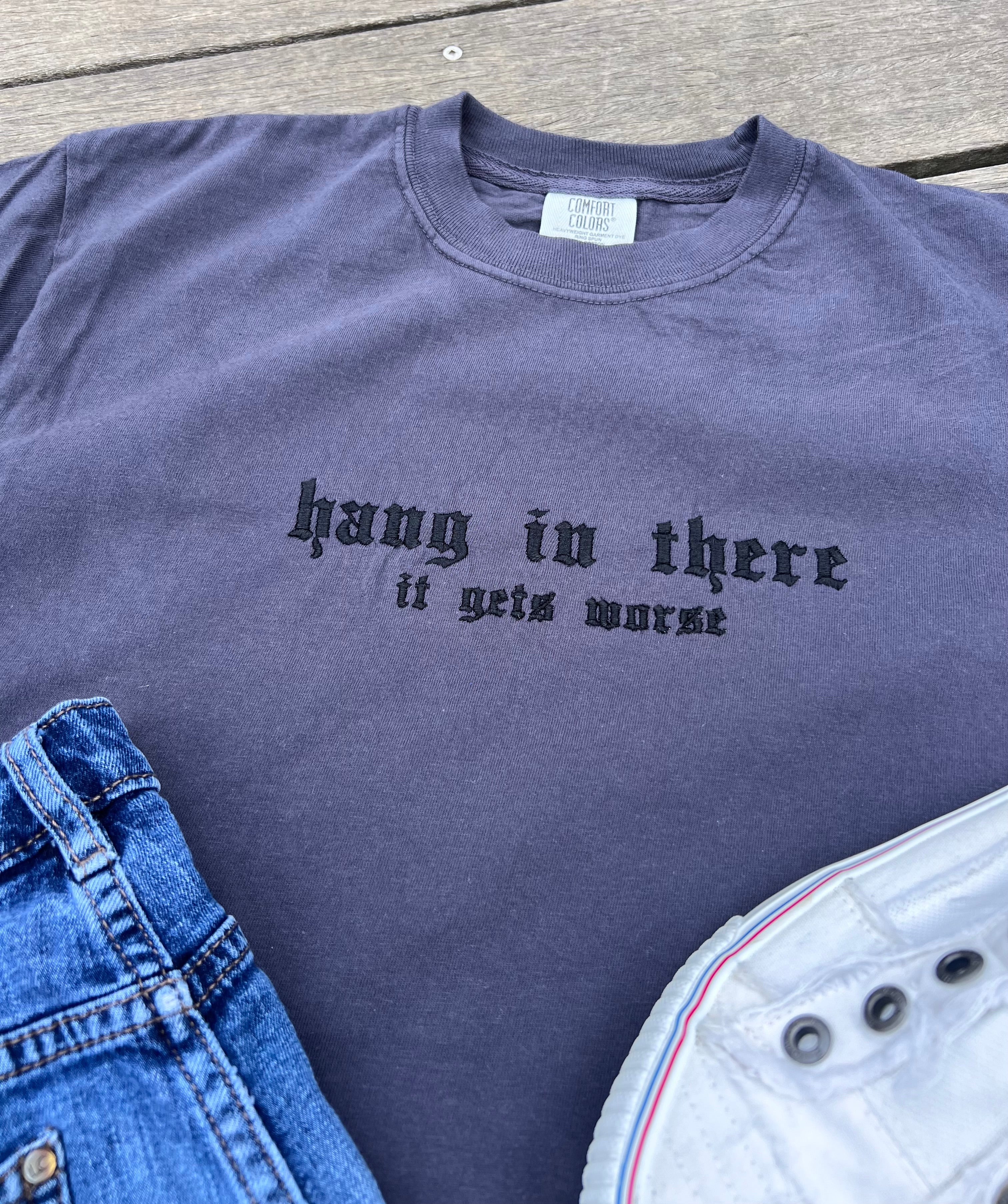 hang-in-there-it-gets-worse-t-shirt