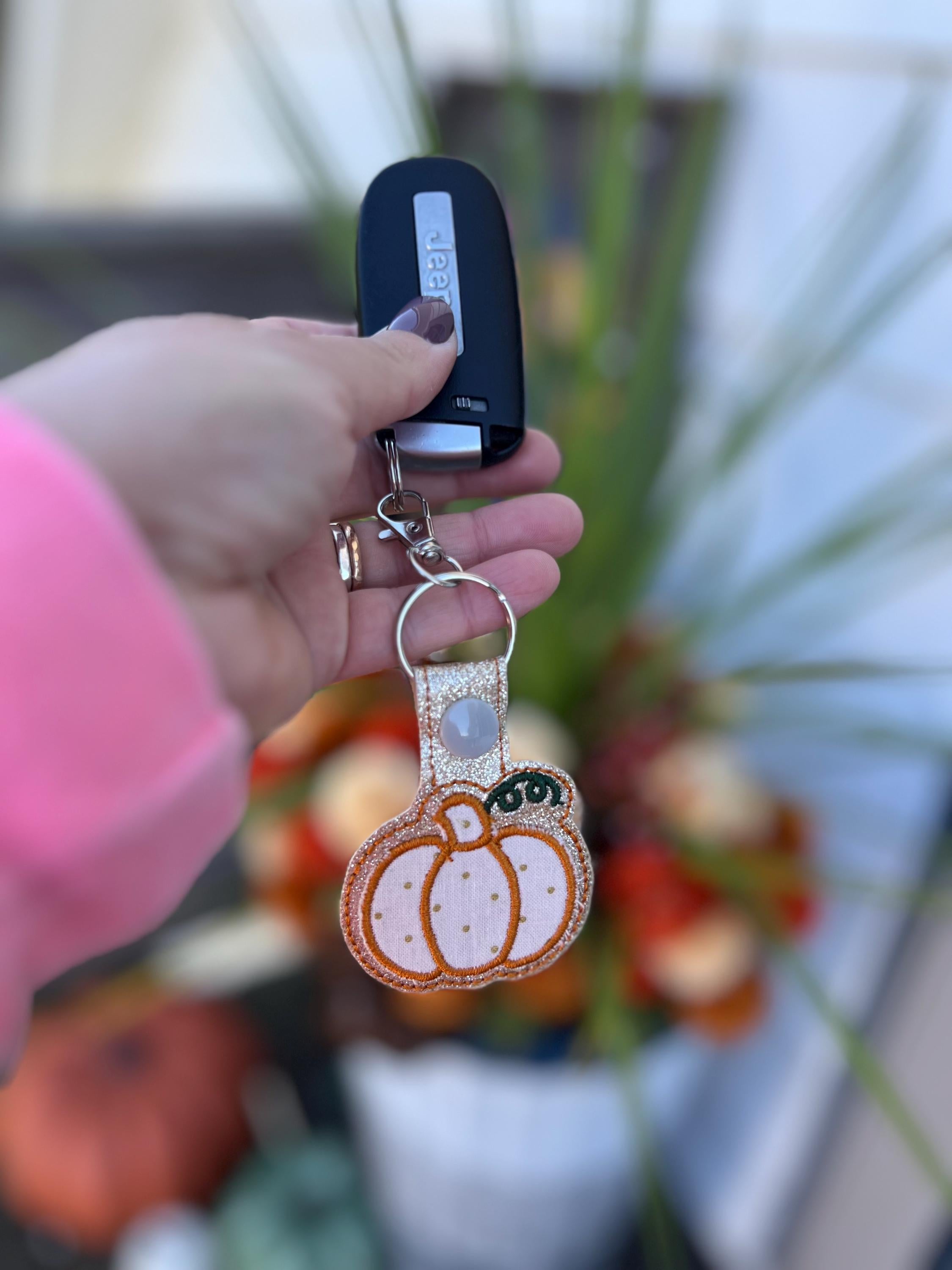 pumpkin badge reel with glitter and polka dots