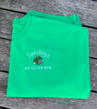Green sweatshirt with sundays are for the birds and helmet design 
